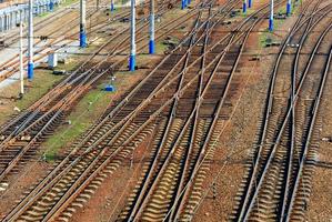 A powerful network of multi-channel railway tracks with a turn for the passage of electric trains. photo