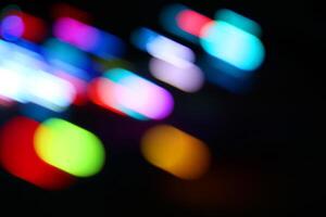 Abstract blur light background.multicolored decorating light.abstract light.Beautiful colorful on black photo