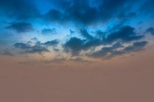 Blue sky with gray clouds. sunshine day with blue sky in evening background photo