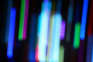 Abstract blur light background.multicolored decorating light.abstract light.Beautiful multicolored on black photo