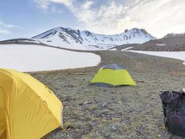 Tents of tourists are located at the foot of Mount Erciyes in central Turkey photo