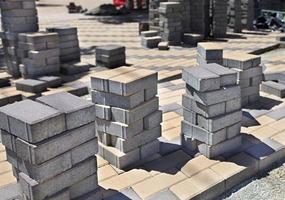 Stack of paving stones on construction site photo