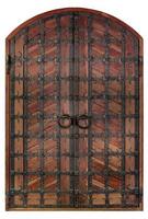 Las puertas de madera antiguas están cubiertas con celosía de hierro forjado y barras transversales. foto