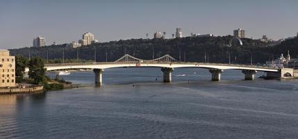 View of the Havanskiy Bridge across the Dnipro River in Kyiv photo