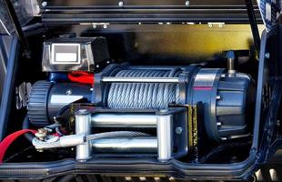 A powerful electric winch is located in the cargo compartment of an equipped fire truck. photo