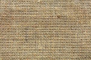 The background and texture of the weave of old burlap photo