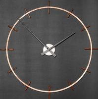 Unusual industrial brass wall clock on a granite black background. photo