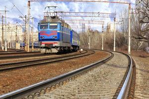 Perspective and turn of a multichannel railway for electric trains photo