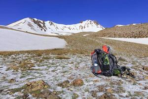 Tourist backpacks are located at the foot of the mountain Erciyes photo