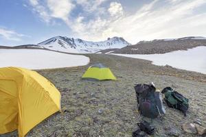 Tents of tourists are located at the foot of Mount Erciyes in central Turkey photo