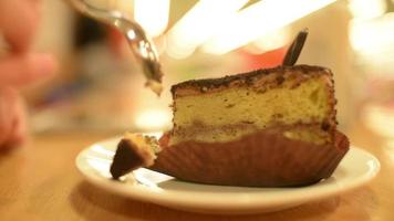 People eating sponge cake with spoon video