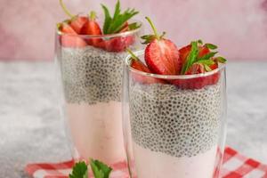 Tasty healthy breakfast, yoghurt with chia seeds and fruit photo