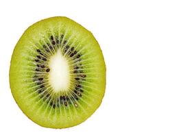 Ripe juicy kiwi fruit in a close-up section photo