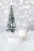 PMerry Christmas greetings and podium or pedestal in the snow with christmas tree on a bokeh background vertical format photo