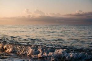 Sunset at sea. Beautiful sunset on the beach and sea photo