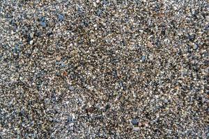 Gravel pattern of wet colored stones. Abstract nature pebbles background