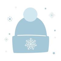 Warm winter blue hat for autumn or spring, an accessory for a man or a woman. Decorated with a snowflake and a pompom. Fluffy fabric. Simple vector illustration in flat style isolated on white