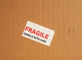 Fragile handle with care sign photo