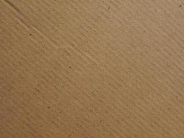 Fondo de textura de cartón corrugado marrón grunge foto
