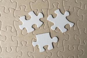 Jigsaw puzzle on incomplete puzzle photo