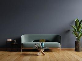 Interior of light room with sofa on empty dark blue wall background. photo