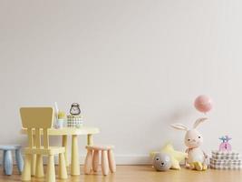 Mock up wall in the children's room with kid table set in light white color wall background.