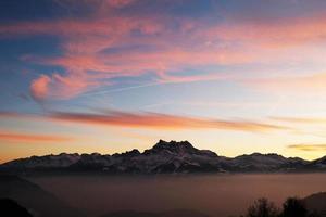 Sunset over the mountains photo