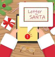 Santa claus is sitting at his workplace desk and receiving one message on his tablet. vector