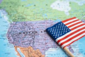 Bangkok, Thailand 2021 - USA America flag on world map background. photo