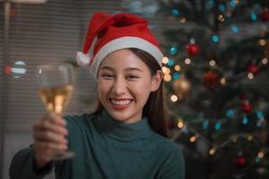 Toasting a glass of champagne for Christmas or happy new year photo