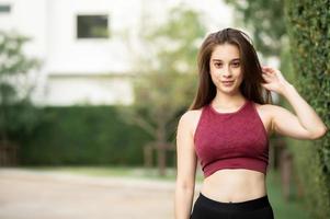 sporty woman standing outdoor photo