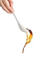 chef pouring noodle soup on white background, Soup for sukiyaki from chicken and fish photo