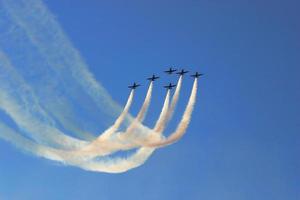 Synchronized team flight- flying in formations photo