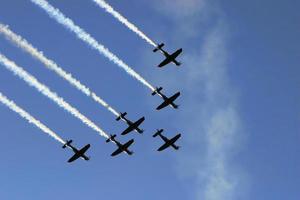 Synchronized team flight- flying in formations photo