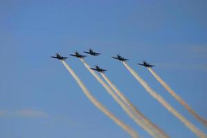 Synchronized team flight- flying in formations photo