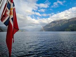 With a cruise ship in the fjords of norway photo