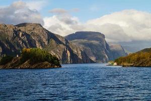 With a cruise ship in the fjords of norway photo