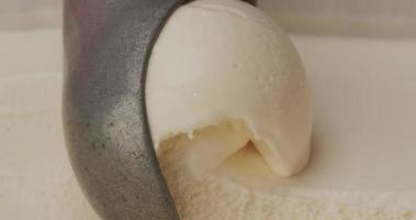 Close up Vanilla ice cream scoop. video