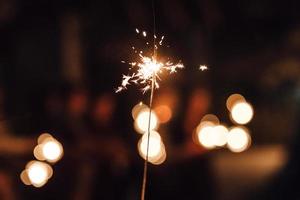 sparklers at the wedding of the newlyweds photo