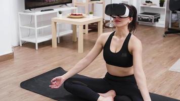 Barefoot caucasian young woman with vr headset