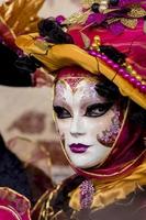 VENICE, ITALY, 2013 - Person in Venetian carnival mask. photo