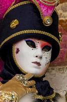 VENICE, ITALY 2013 - Person with Venetian carnival mask photo