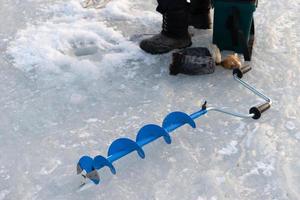 Winter fishing, ice fishing. Vladivostok, Russia photo