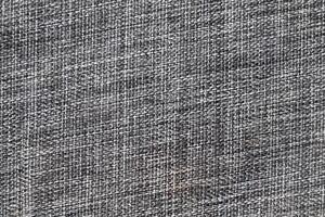 the abstract surface of the woven fabric in grey for a background pattern. a detailed element graphic for a creative design. photo