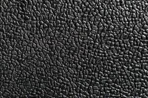 la textura de cuero artificial en negro para una colección de patrones de fondo. un elemento gráfico para un diseño creativo. foto