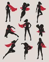 conjunto de superhéroe femenina con capa roja vector