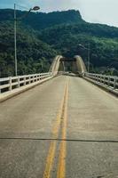 Tied-arch bridge Ernesto Dornelles made of concrete over the Antas River, amid wooded landscape near Bento Goncalves. A friendly country town in southern Brazil famous for its wine production. photo