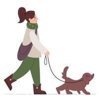 A girl in comfortable clothes is walking the dog. Walk in the park. Pets. Brown dog on a leash.A girl in comfortable clothes is walking the dog. Walk in the park. Pets. Brown dog on a leash. vector