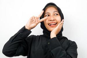 Closeup of cheerful beautiful young muslim woman isolated photo