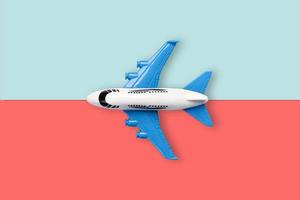 Plane model on colore background photo